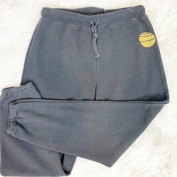 SISSTREVOLUTION BLACK ELASTIC WAIST JOGGER PANTS YELLOW SUN GRAPHIC WOMENS LARGE - Picture 1 of 4